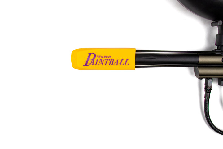 gold and purple pew pew paintball barrel cover on barrel